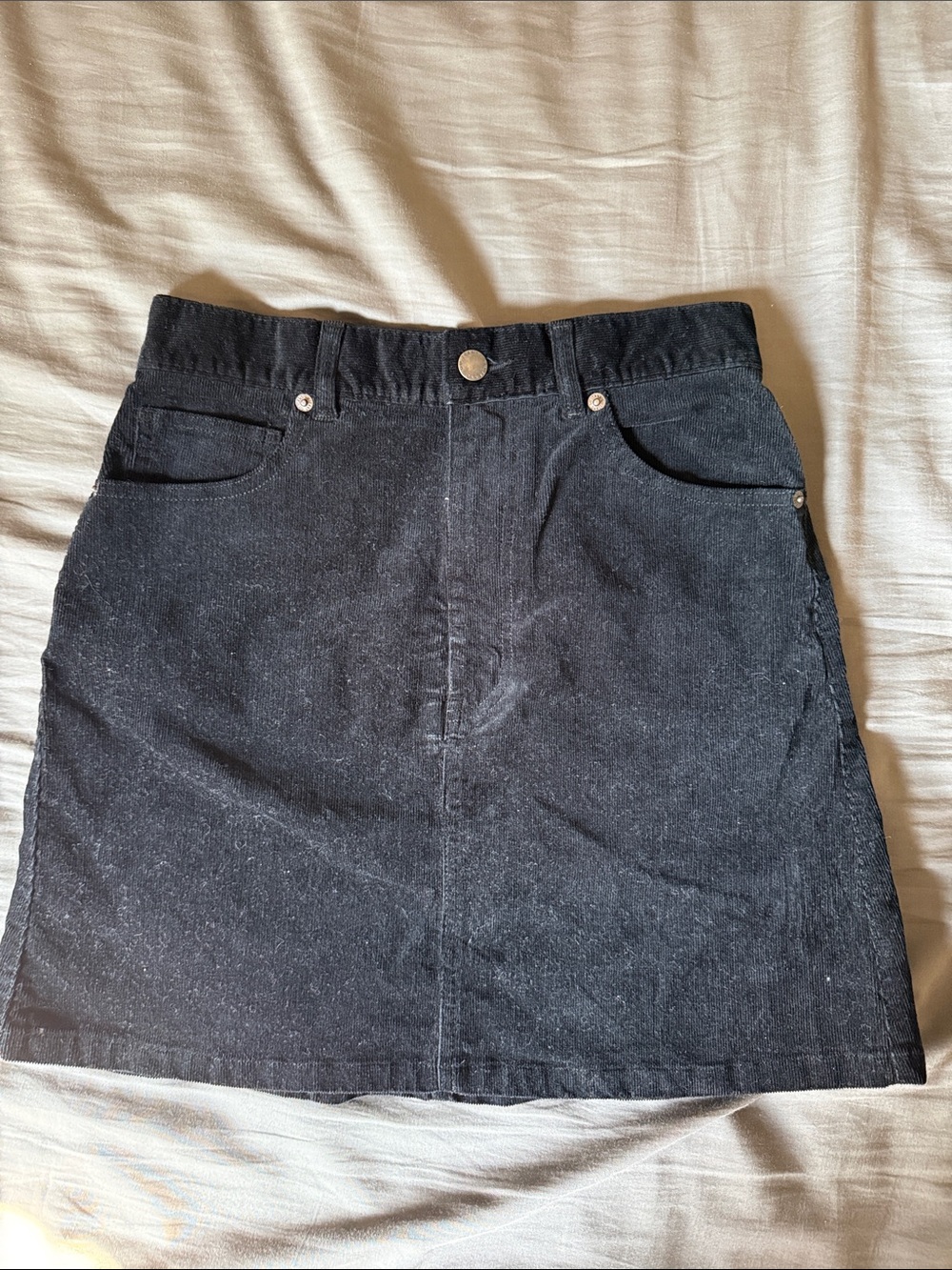 Black Mini Denim Skirt with Front Pockets